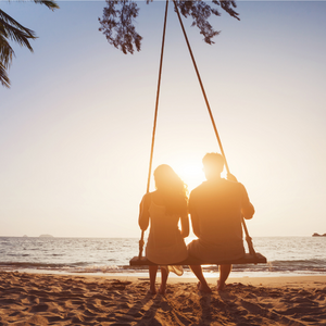 Great Getaway Travel | Local Travel Agency | Couple on Honeymoon on the Beach