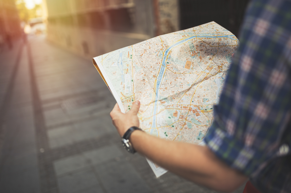 Great Getaway Travel | Local Travel Agency | Person Looking at a Map
